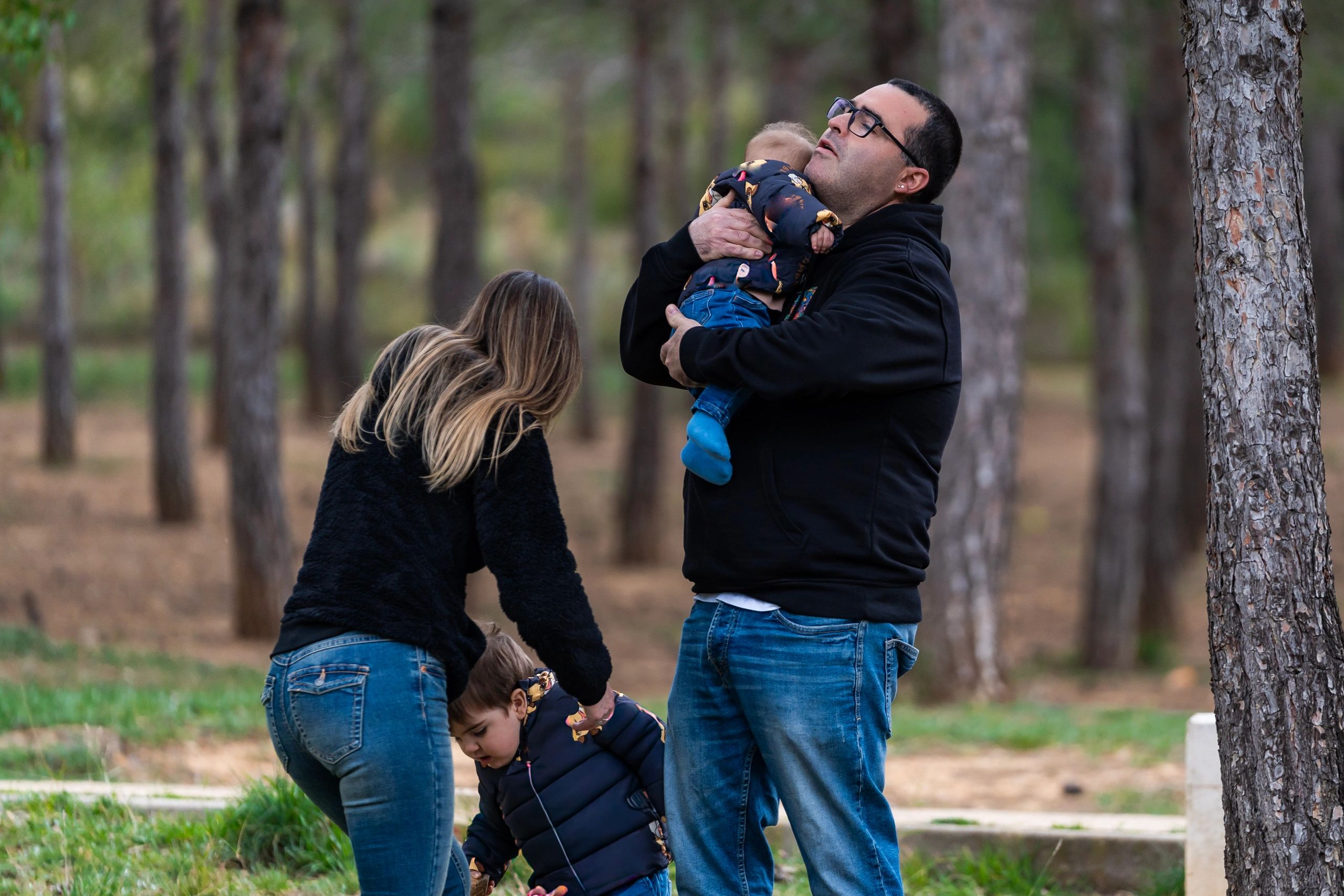 Family enjoying time outdoors during a photo session